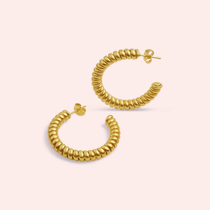 Melony Hoops σκουλαρίκια κρίκοι σπιράλ